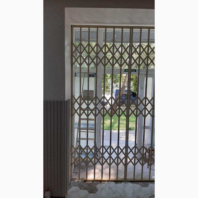 Фото 6. Розсувні решітки металеві на вікна, двері, вітрини. Виробництво установка по Україні