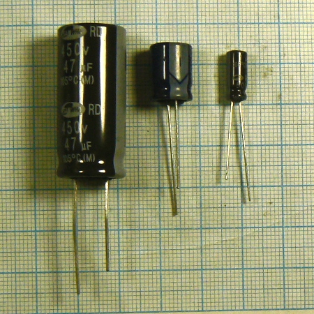 Фото 3. Конденсаторы электролитические вертикальные (в том числе l.esr) 1…22000 мкф 6.3…450 вольт