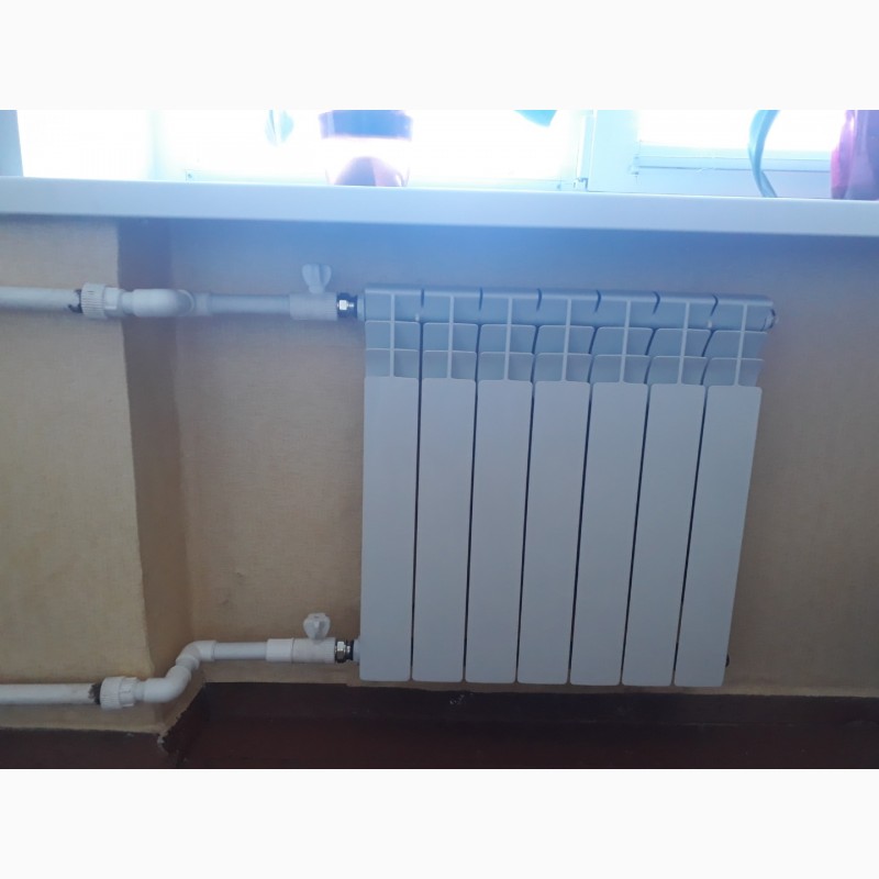 Фото 7. Монтаж систем отопления в доме и установка радиаторовв Черкассах